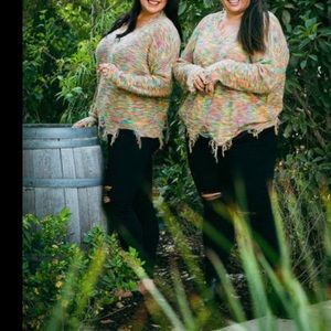 Plus size rainbow sweater lightly distressed